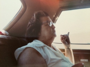 Grandmom deep in thought while we were probably driving to Maine.